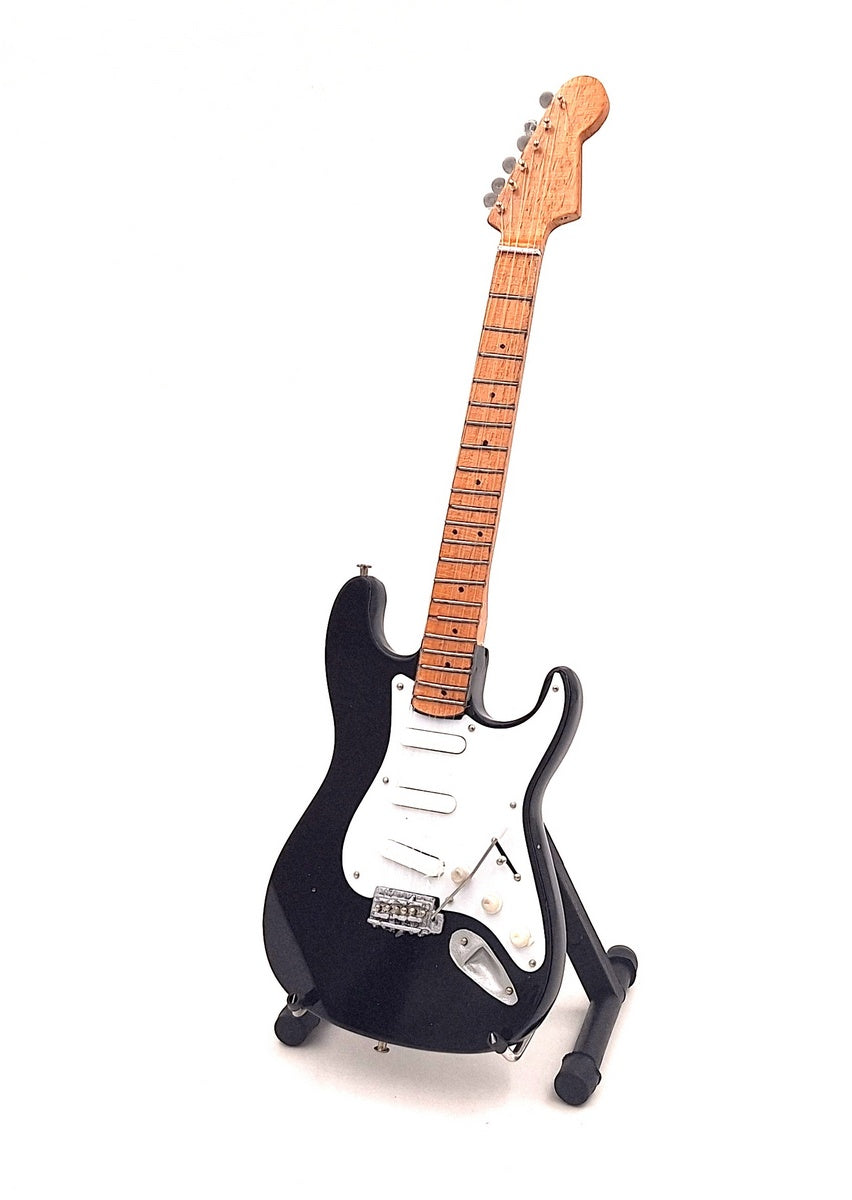 Mini gitara inšpirovaná Kurtom Cobainom s možnosťou personalizácie gravírovaním, ručne vyrobená z mahagónového dreva, čierna/biela, výška 27,5 cm