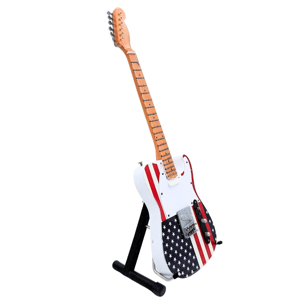 Zberateľská mini gitara MGT-2639 v štýle Bruce Springsteen s možnosťou personalizácie gravírovaním, ručne vyrobená z mahagónu, ideálny darček pre fanúšika hudby, výška 27,5 cm