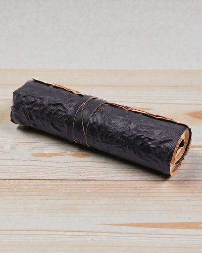 Zrolovaný kožený cestovný zápisník – 96 strán – čierny 21x15cm